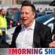 A photo of Elon Musk shrugging at an event in Germany.